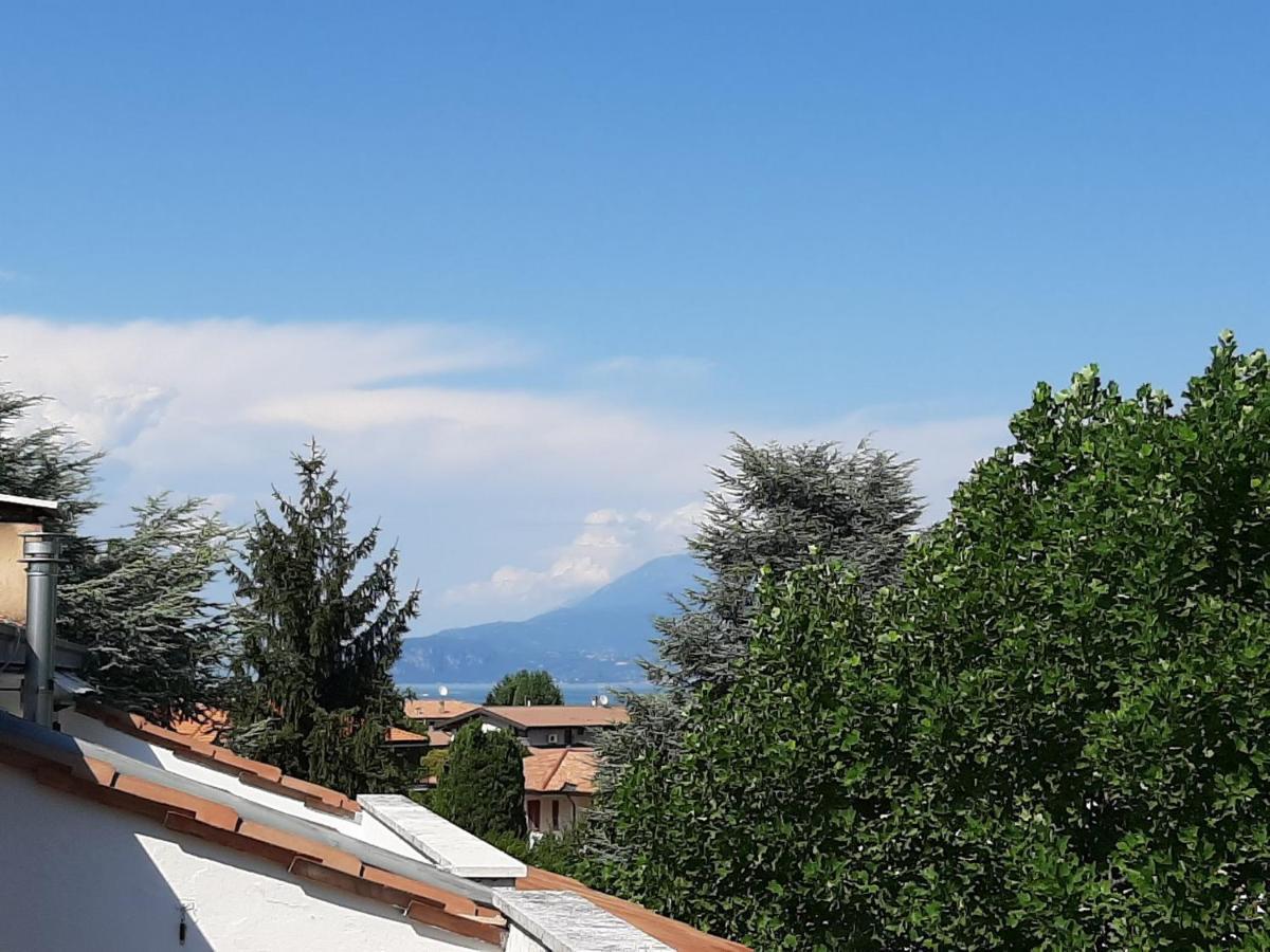 Appartamento Genziana - Con Vista Piscina E Garage シルミオーネ エクステリア 写真